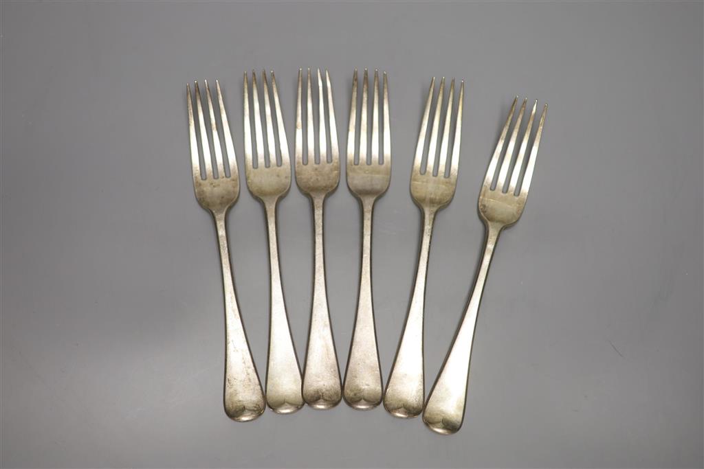 A set of six George IV silver Hanover pattern table forks, crested, London 1828, maker probably William M. Traies, 14oz